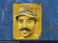 Face on yellow poster